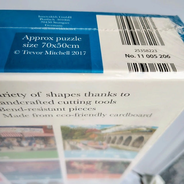 Close-up of a puzzle box with text and a barcode