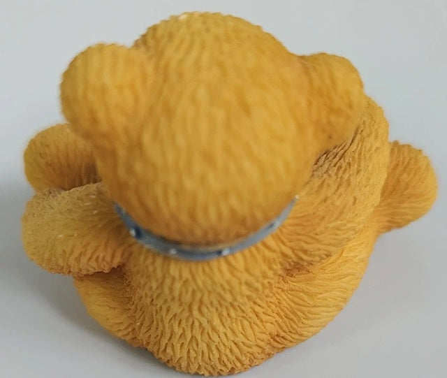 Yellow textured object on a white background