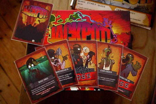 Collection of 'Hackspom' trading cards on a wooden surface