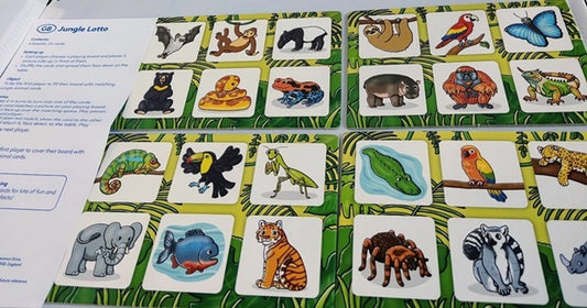 Jungle-themed educational game cards with animal illustrations on a green background