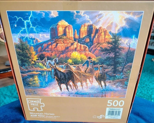 Jigsaw puzzle box with mountain horses design and '500' pieces visible