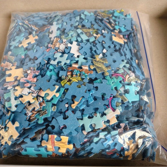 Bag of assorted puzzle pieces with a focus on blue ones.