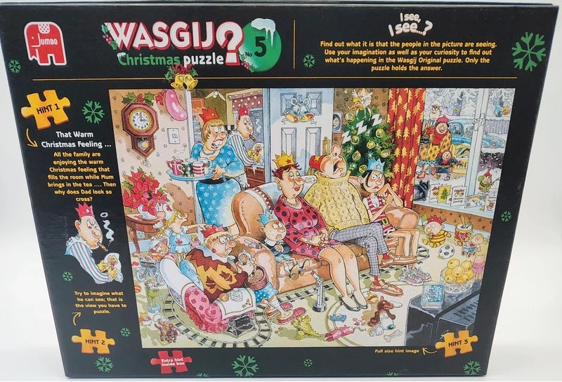 Wagyu Original 2015 Christmas jigsaw puzzle box, featuring a colorful cartoon illustration of a festive living room scene with people, a Christmas tree, and holiday decorations on a black background.