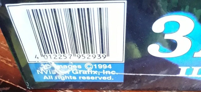 Barcode and copyright notice on a product label with a blue number '3' in the corner.