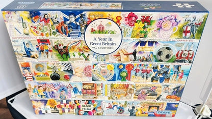 A Year In Great Britain Jigsaw puzzle box with colorful illustrations of a year in Great Britain on a white background