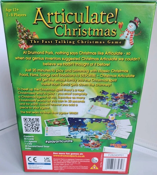 Back of a 'Articulate! Christmas' board game box with text and graphics.