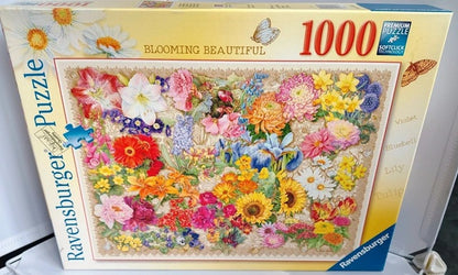 Colourful collage of different flowers from the Ravensburger Blooming Beautiful 1000 piece jigsaw puzzle.