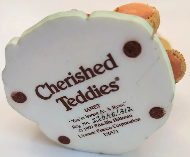 Heart-shaped ornament with 'Cherished Teddies' branding and text on a white background