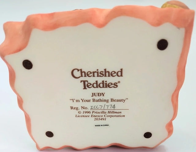 Cherished Teddies Judy figurine. Cherished Teddies' branding on a white background