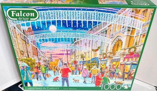 Falcon de luxe puzzle box with a colorful winter scene of a city street. Christmas in Cardiff 1000 piece jigsaw puzzle.