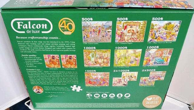 Green puzzle box with images of puzzles and Falcon de luxe branding