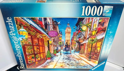 Ravensburger puzzle box with a city street scene on the cover. Christmastime 1000 piece jigsaw puzzle.