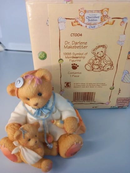 Teddy bear with a baby and packaging in the background