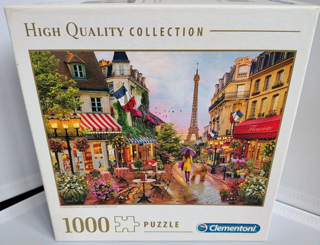 Jigsaw puzzle box with a scenic cityscape design and 'Clementoni' branding.