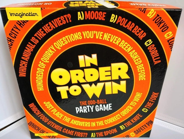Board game box titled 'In Order to Win' with orange and black design.