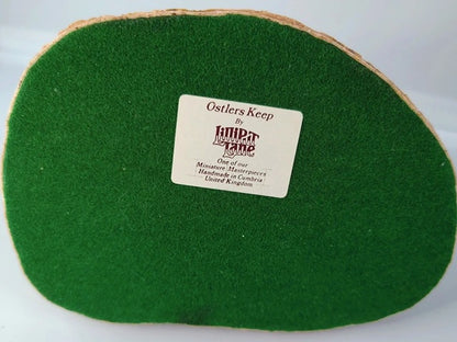 Base of ornament showing Ostlers Keep sticker.