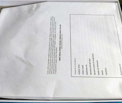 Close-up of a document inside a white box with text on it.