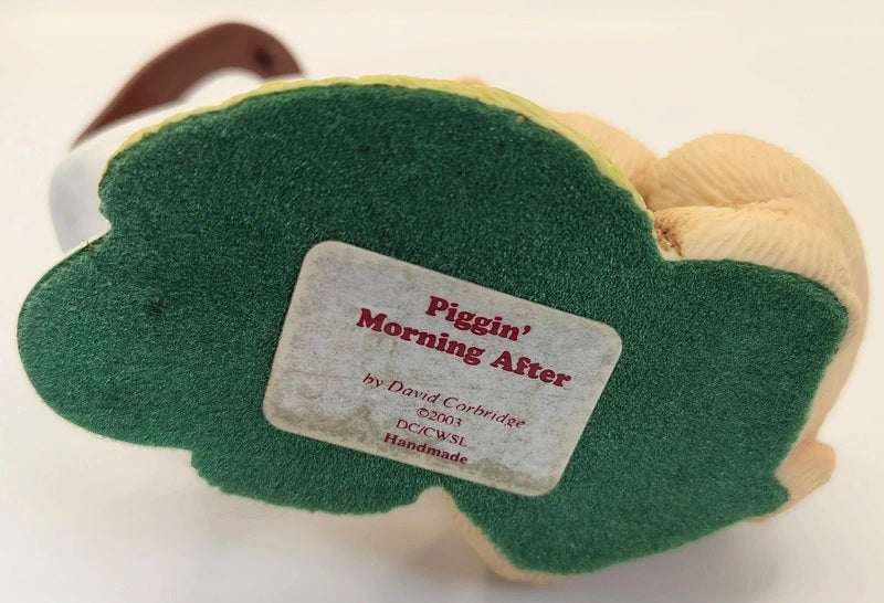 A handmade Piggin' Morning After figurine.
