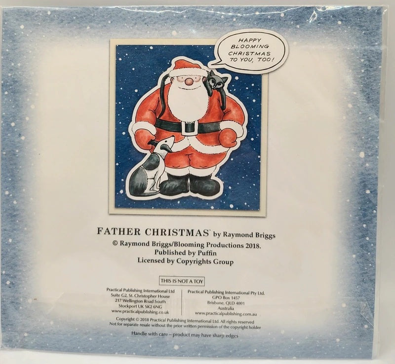 A vintage collectible ornament package for 'Father Christmas' by Raymond Briggs, featuring a Santa Claus illustration on a blue starry background with a speech bubble reading 'HAPPY BLOOMING CHRISTMAS TO YOU, TOO!'.