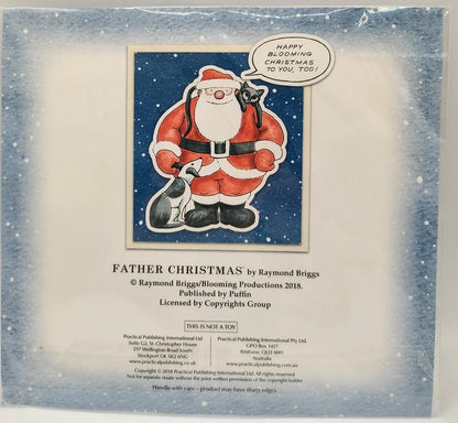 A vintage collectible ornament package for 'Father Christmas' by Raymond Briggs, featuring a Santa Claus illustration on a blue starry background with a speech bubble reading 'HAPPY BLOOMING CHRISTMAS TO YOU, TOO!'.