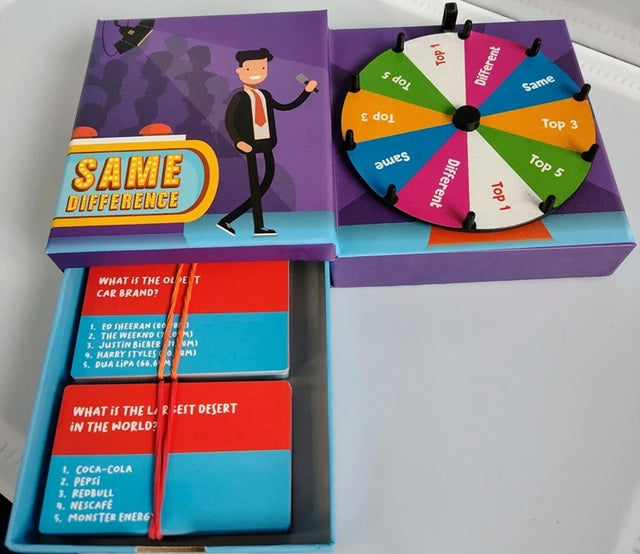 Board game set with question cards and a spinner labeled 'Same Difference' on a white background.