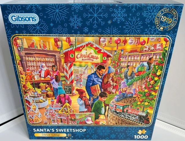 Gibsons Santa's Sweetshop jigsaw puzzle box with colorful illustration of a Christmas scene.