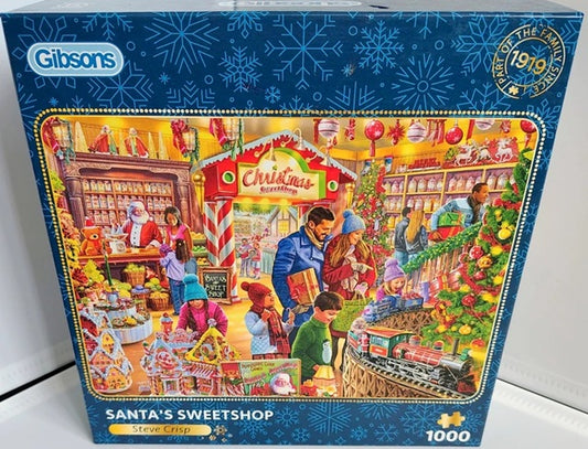 Gibsons Santa's Sweetshop jigsaw puzzle box with colorful illustration of a Christmas scene.