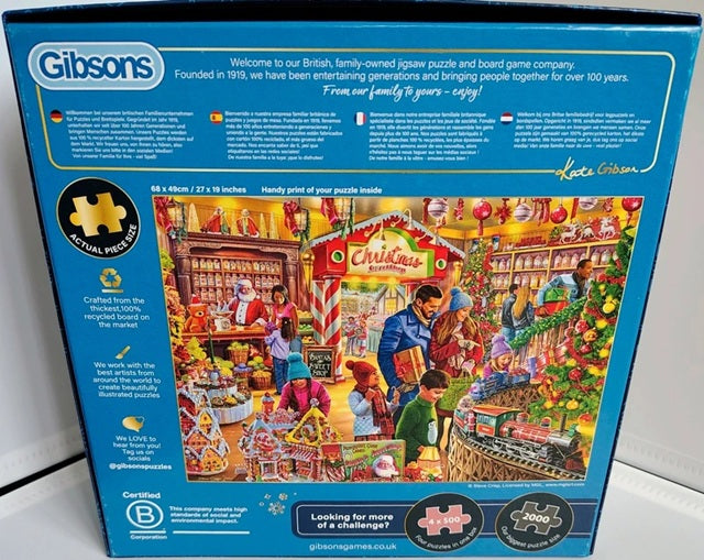 Gibsons puzzle box with a colorful illustration of a Christmas market scene on a blue background.