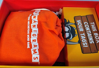 Orange tile bag 'Bananagrams' text and a yellow box with text and graphics in a red box.