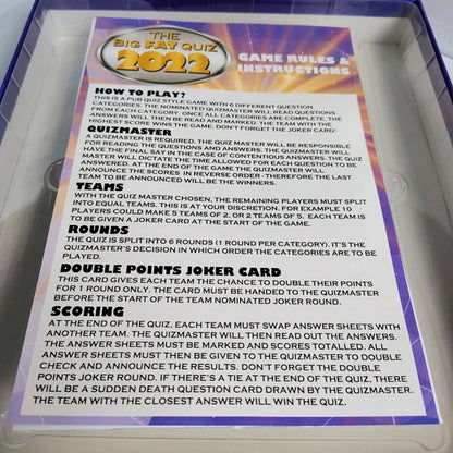 Game rules and instructions for 'The Big Fat Quiz 2022' displayed on a card.