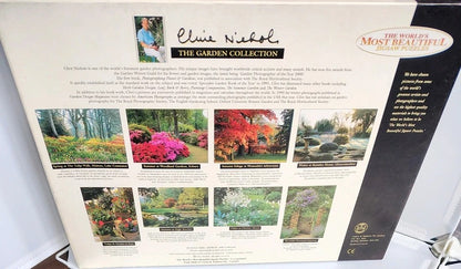 Back cover of a boxed puzzle from The Garden Collection featuring Clive Nichols, with multiple small garden scene photos and product text on a white background.