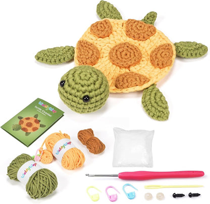 WaldyWop Turtle Coaster Crocheted turtle toy Kit with yarn, hooks, and instructions on a white background