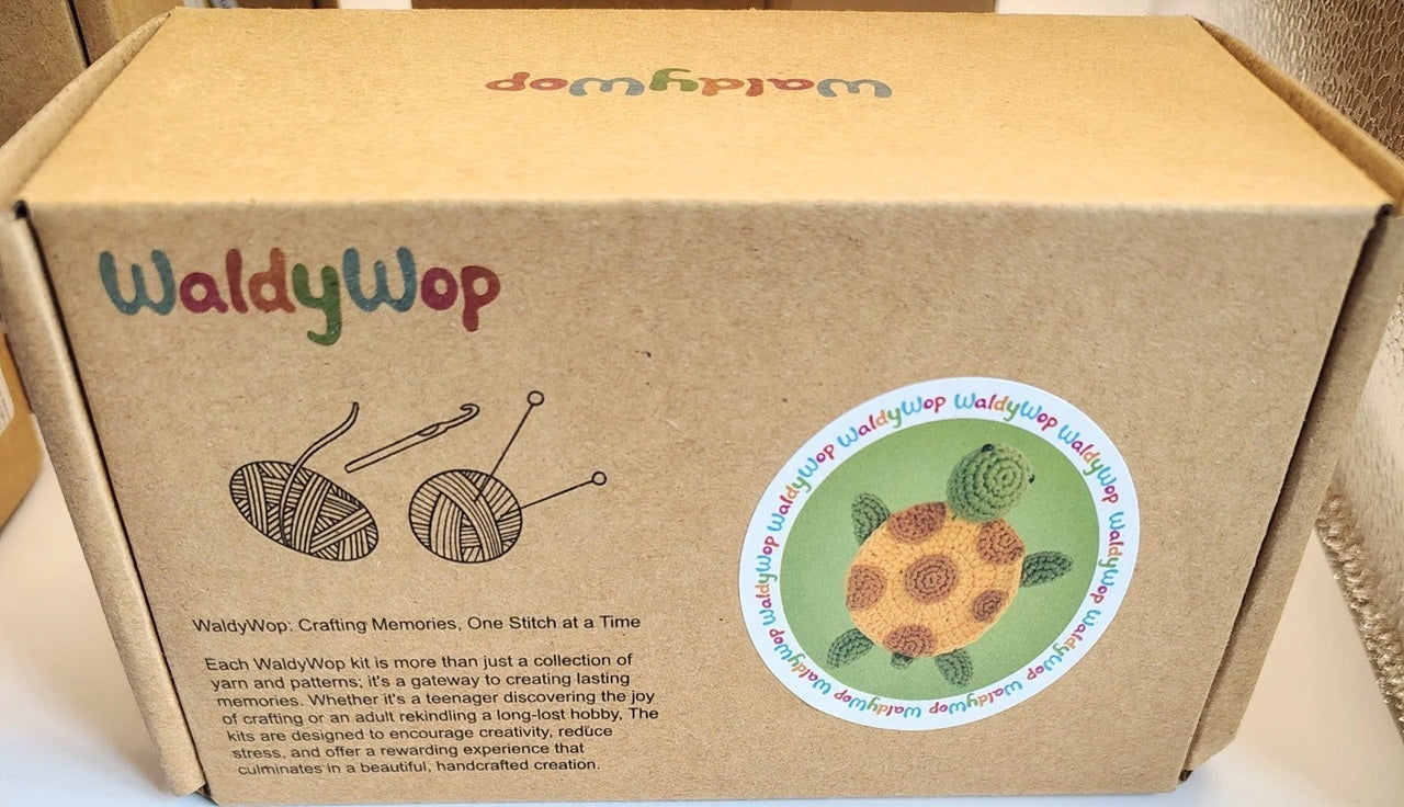 WaldyWop cardboard box with branding and product details