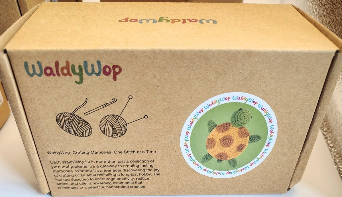 WaldyWop cardboard box with branding and product details