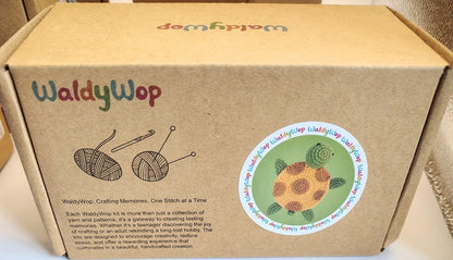WaldyWop cardboard box with branding and product details
