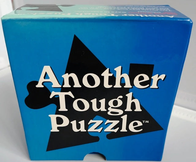 Blue box with 'Another Tough Puzzle' text on a white background