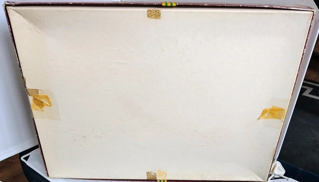 Close-up of a wooden box with gold accents on a white background