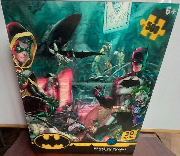 Batman-themed puzzle packaging with characters and 3D image text.