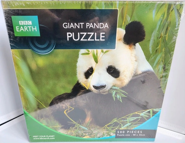 Giant Panda Puzzle packaging with a panda bear on a green background