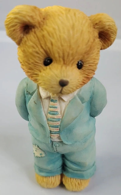 Cherished Teddies bear in a light blue suit with a white shirt and striped tie on a white background. A Father is the Bearer of Strength. 624888.