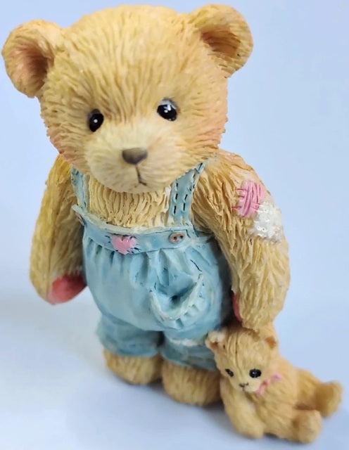 Cherished Teddies Child Of Hope Younger Son teddy bear in overalls holding a smaller teddy bear on a light blue background. Our Cherished Family. 624837.