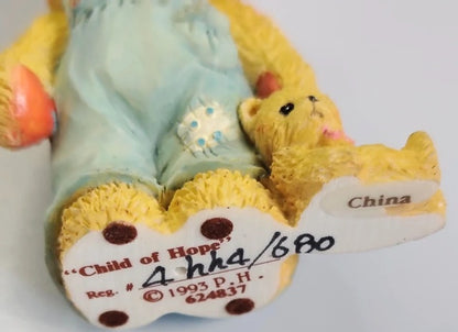 Decorative item with a teddy bear and text on a white background