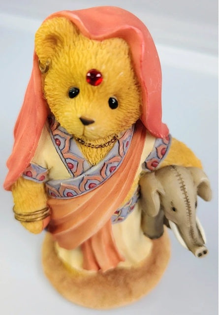 Cherished Teddies Rajul dressed in traditional attire with a pink scarf and jewelry on a white background