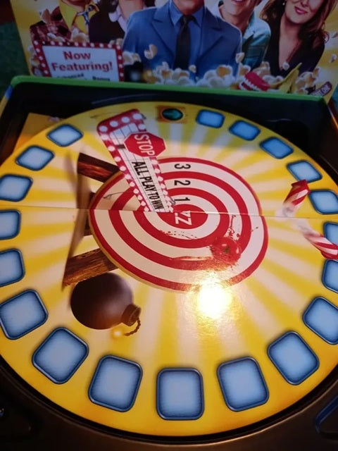 Toy spinning wheel with numbers on a colorful background