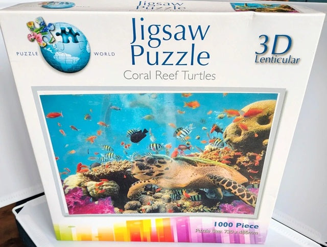 Jigsaw puzzle box with a 3D lenticular design of coral reef turtles and fish.
