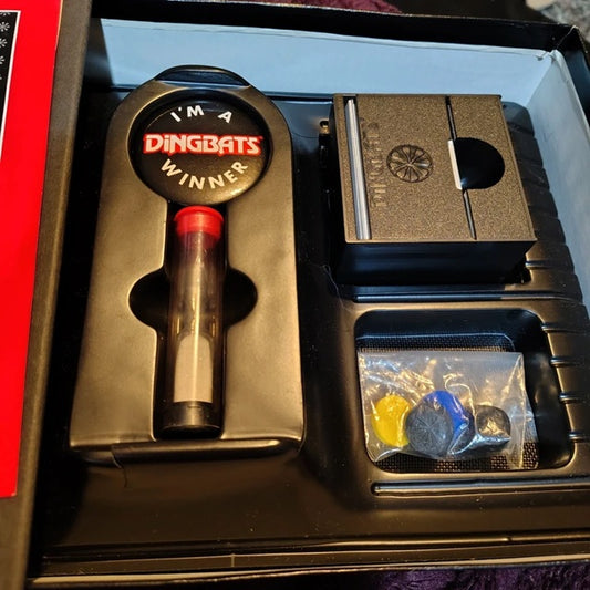 Dingbat's product with a red and black design in a box