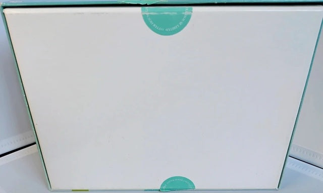 White box with a green label on a white background