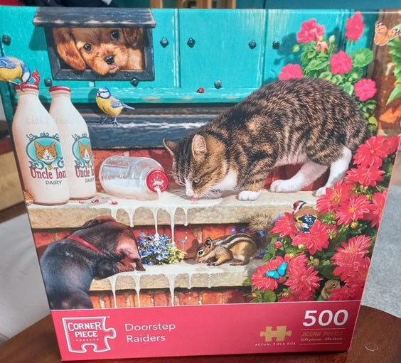 Jigsaw puzzle box featuring a cat, dog, and chipmunk at a door with flowers and bottles in the background.