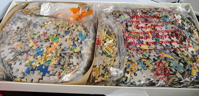 2 x 1024 piece bagged jigsaw puzzles.