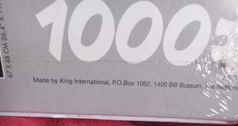 Product packaging with '1000' branding and King International contact information.